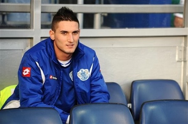 Queens Park Rangers' Federico Macheda of Italy sits on the bench during the Barclays Premier League match against Norwich at Loftus Road, London Monday Jan. 2, 2012. Macheda is on loan to QPR from Manchester United until the end of the season.