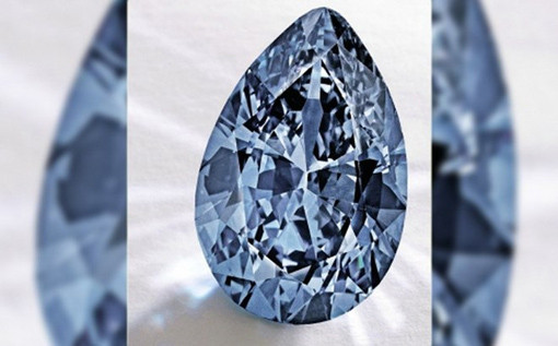 Viên kim cương xanh lập kỷ lục đấu giá 32,6 triệu USD