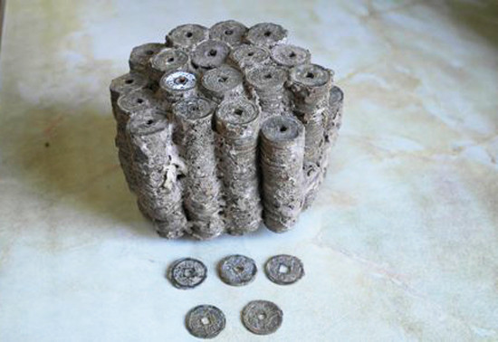 Mua cát xây nhà, phát hiện 4,5 kg tiền cổ