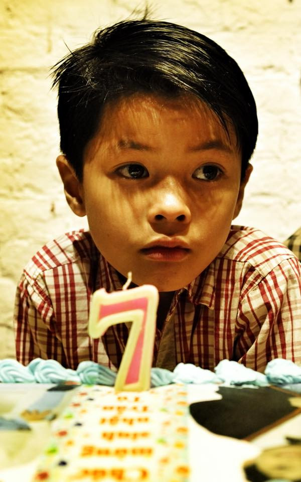 Trần Bờm bảnh trai trong sinh nhật 7 tuổi