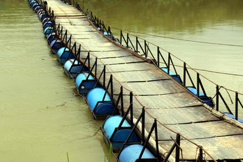 “Kỹ sư hai lúa” bỏ 300 triệu xây cầu, chế tạo máy cày cho dân