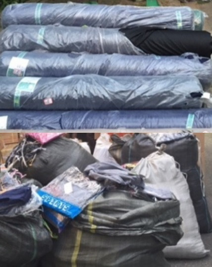 Tịch thu hơn 2 tấn vải, hàng trăm bộ quần áo hàng hiệu nhập lậu