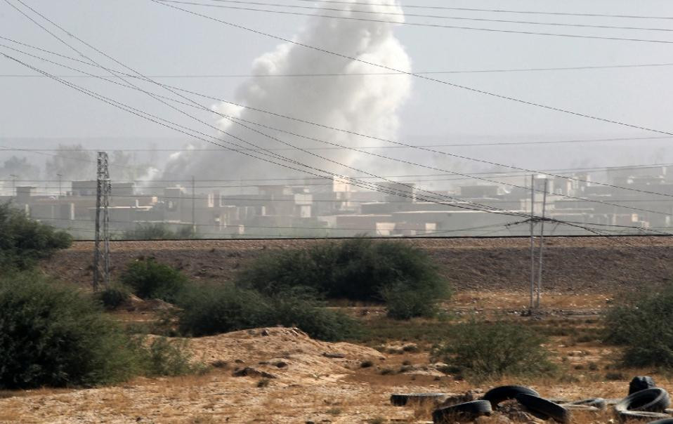 Phát hiện 19 mộ tập thể chôn hàng trăm tay súng IS