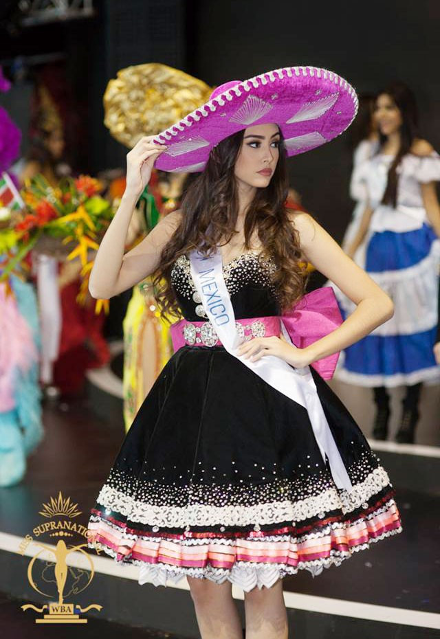 Hoa hậu Siêu quốc gia 2015: Lệ Quyên diện áo dài trong đêm Chung kết