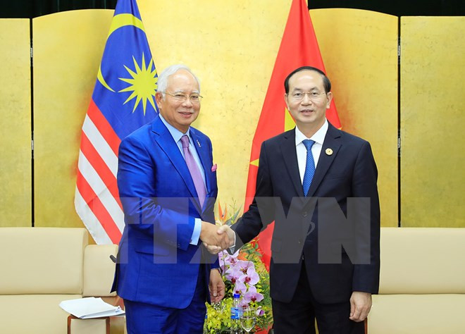Chủ tịch nước Trần Đại Quang gặp song phương với lãnh đạo Papua New Guinea, Mexico, Malaysia, Peru
