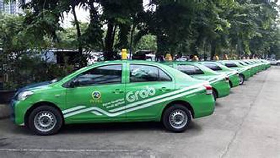 Tiếp tục kéo dài thí điểm hoạt động của Uber, Grab