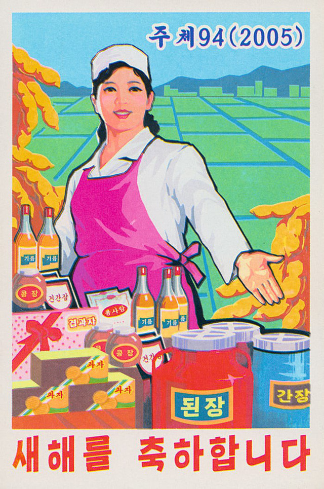 Thiệp chúc mừng năm mới của Triều Tiên vẽ hình một nữ công nhân bên cạnh các sản phẩm được làm từ đậu nành. (Ảnh: Guardian)