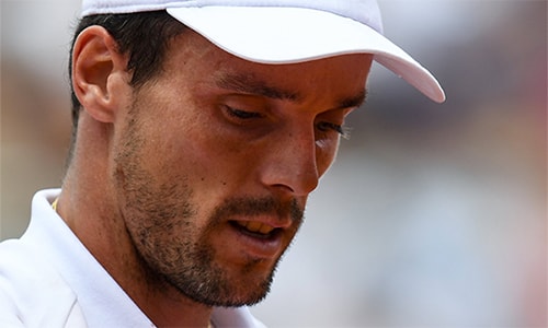 Bautista Agut vào giải với tâm trạng nặng trĩu, nhưng càng đánh càng hay. Ảnh: EPA.