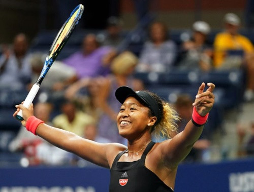 Niềm vui của Osaka sau khi giành chức vô địch Mỹ Mở rộng. Cô là tay vợt người Nhật Bản đầu tiên giành Grand Slam. Ảnh: Reuters.