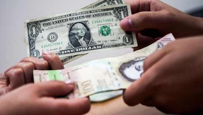 Đồng USD bị loại khỏi thị trường hối đoái Venezuela
