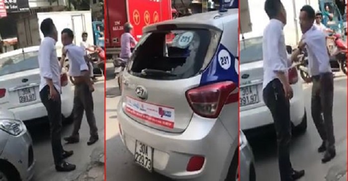 Lùi xe trúng taxi, nam thanh niên còn đập đầu tài xế vào đuôi xe