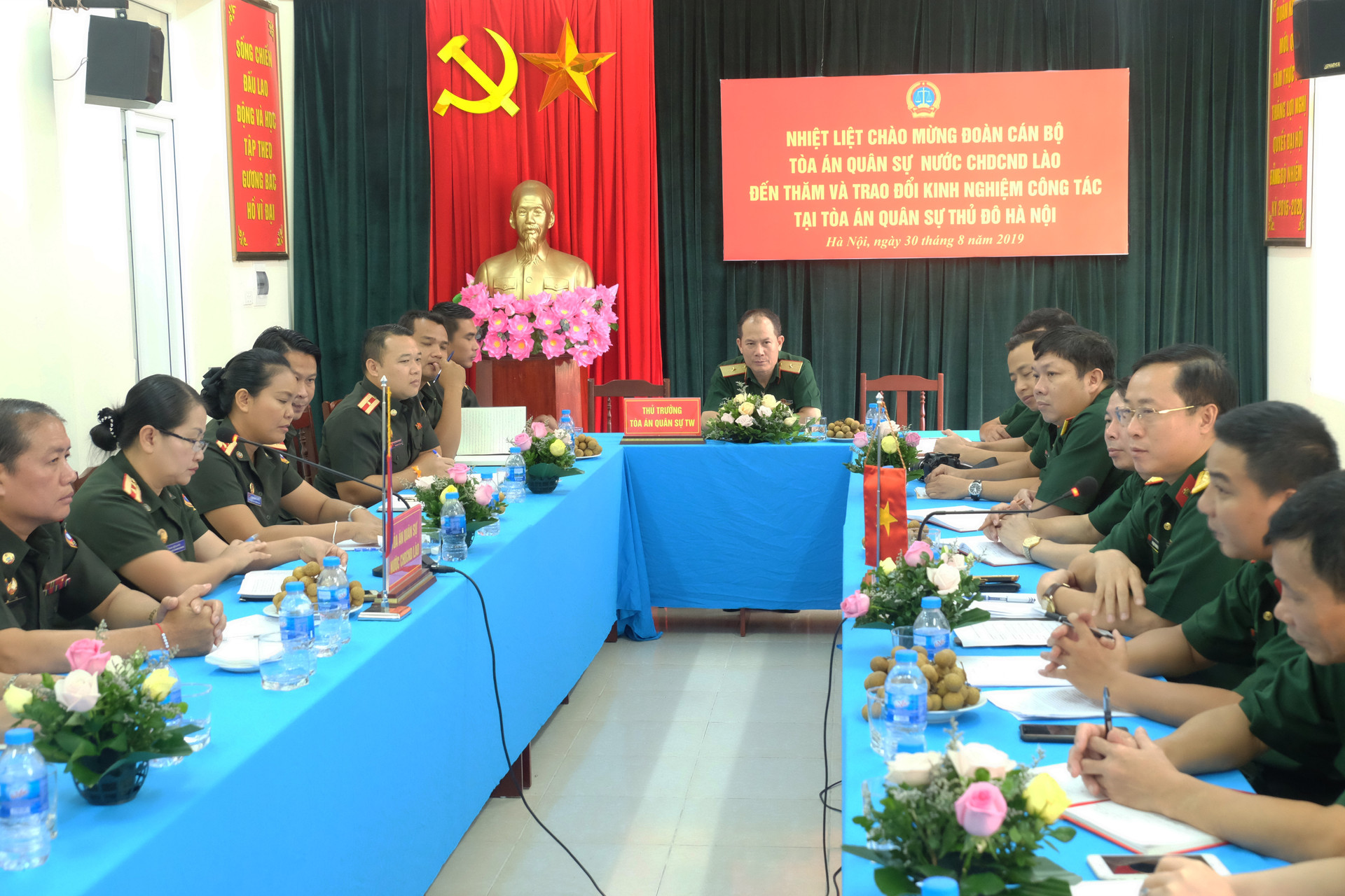 Tòa án quân sự hai nước Việt Nam - Lào trao đổi nghiệp vụ, kinh nghiệm xét xử