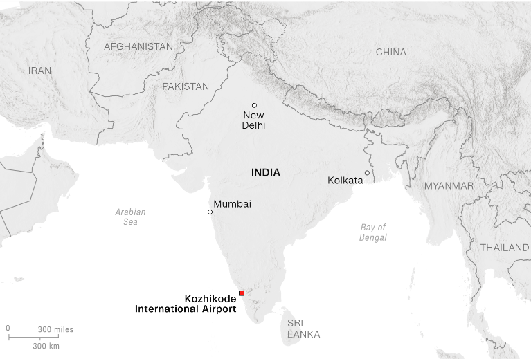 Máy bay Ấn Độ chở 191 người trượt đường băng, vỡ làm đôi - 7