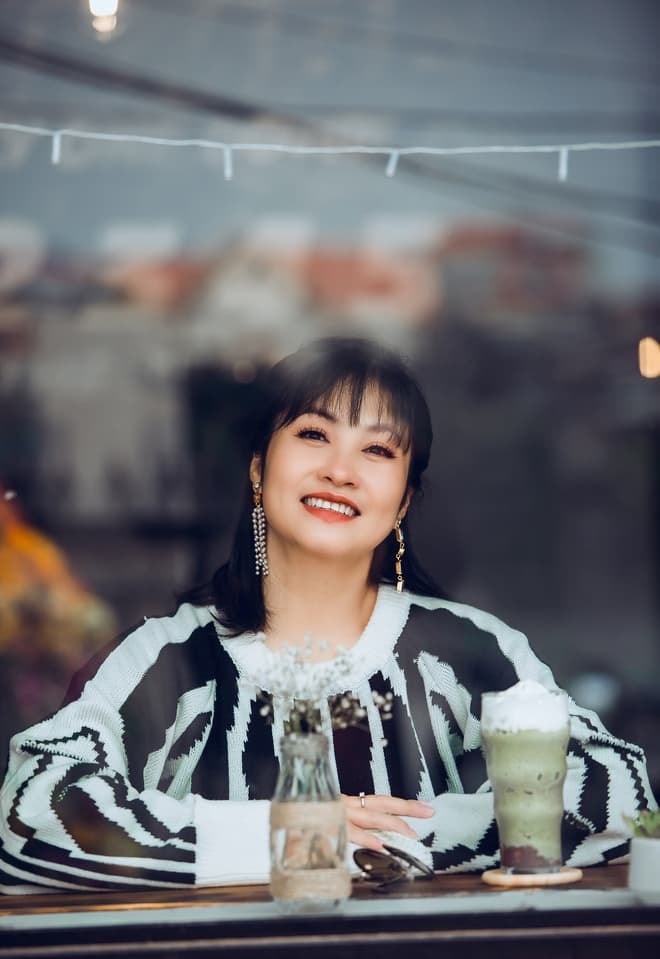 chân dung vợ quang thắng  3