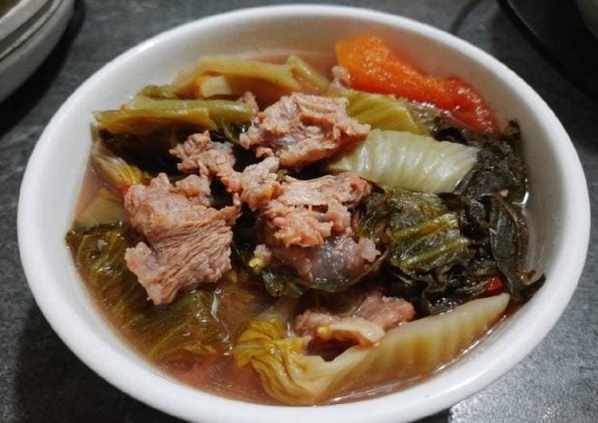 canh nấu dưa chua 0