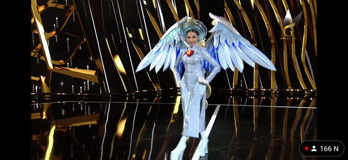Thùy Tiên thăng hoa với 'Thiên thần áo xanh': Fan Miss Grand vỗ tay rào rào với thiết kế ấn tượng Ảnh 6