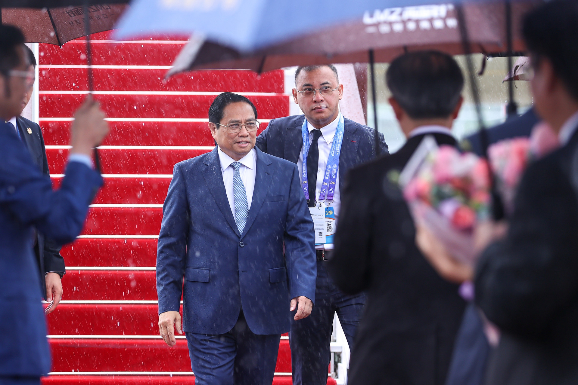 Chùm ảnh: Thủ tướng Phạm Minh Chính bắt đầu chuyến công tác tại Trung Quốc - Ảnh 1.
