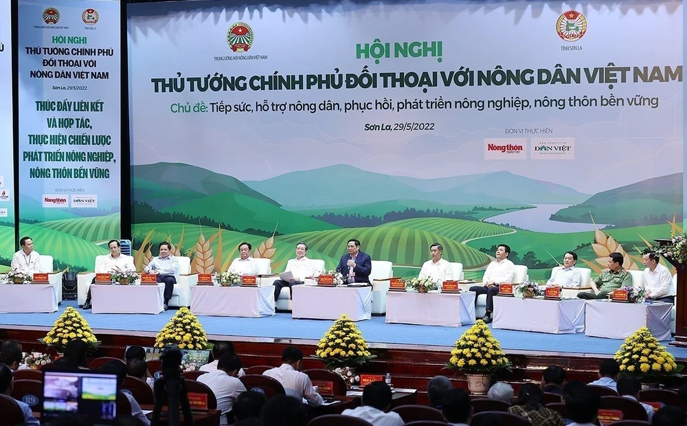 Thủ tướng Chính phủ Phạm Minh Chính đối thoại với nông dân Việt Nam năm 2022. (Ảnh: Dương Giang: TTXVN)