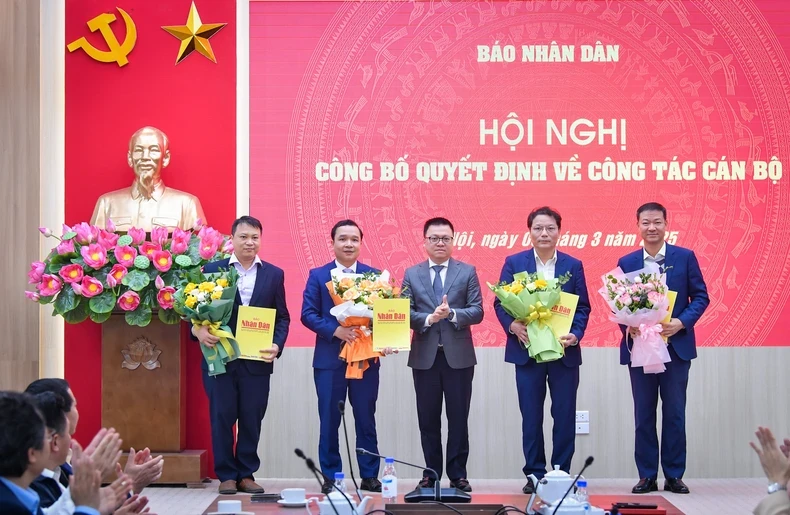 Báo Nhân Dân công bố các quyết định về công tác cán bộ ảnh 1