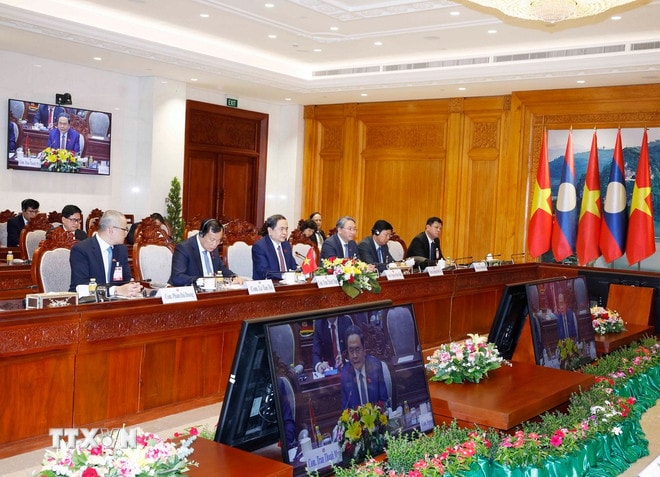 ttxvn-chu-tich-quoc-hoi-tran-thanh-man-gap-chu-tich-quoc-hoi-lao-5.jpg