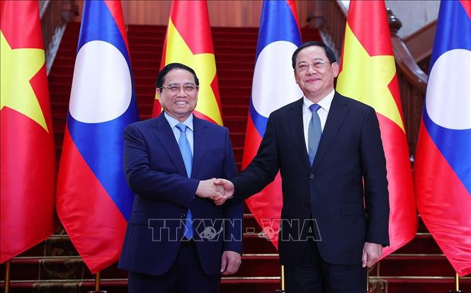 Thủ tướng Phạm Minh Chính gặp Thủ tướng Lào- Ảnh 1.
