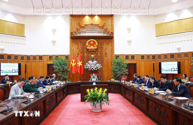 Thủ tướng Phạm Minh Chính chủ trì họp về công tác khắc phục hư hỏng công trình cầu sông Lô thuộc địa bàn xã Đoan Hùng, tỉnh Phú Thọ. (Ảnh: Dương Giang/TTXVN) ttxvn-thu-tuong-chu-tri-hop-khac-phuc-hu-hong-cau-song-lo-14-1.jpg