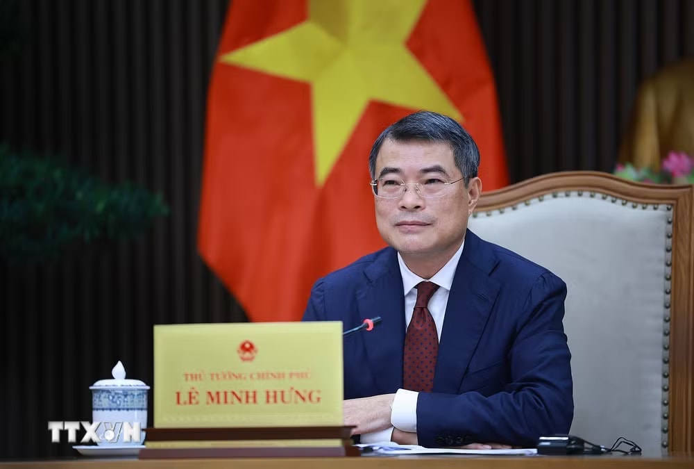 ttxvn-thu-tuong-le-minh-hung-dien-dam-voi-thu-tuong-singapore-3.jpg
