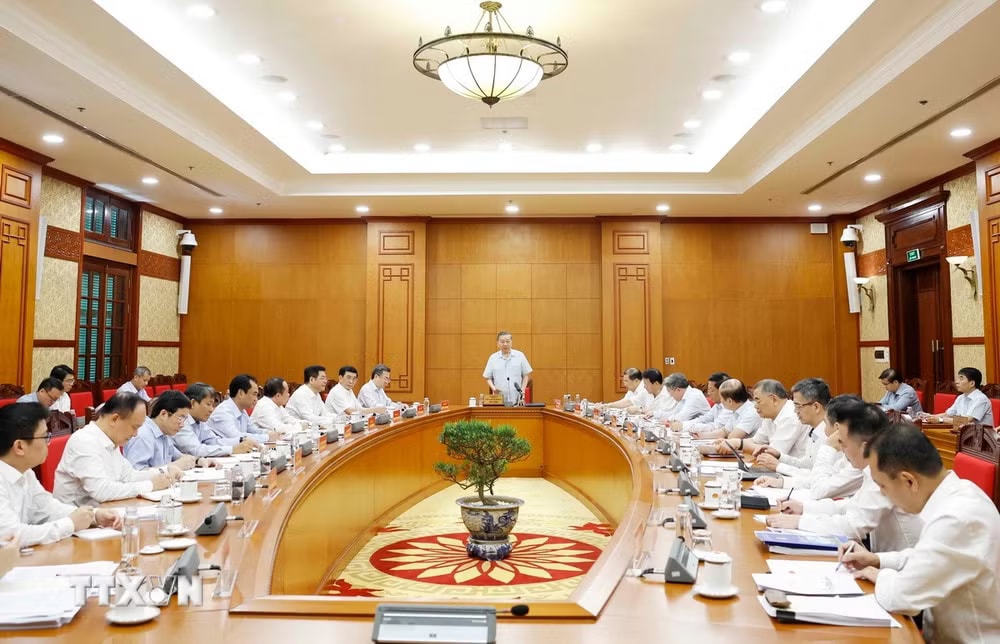 ttxvn-tong-bi-thu-chu-tich-nuoc-chu-tri-lam-viec-ve-de-an-tong-ket-nghi-quyet-36-nqtw.jpg