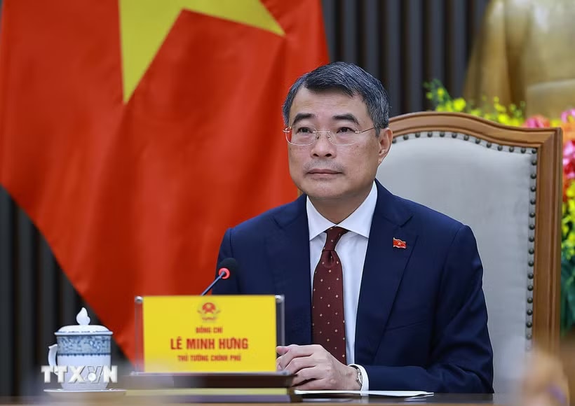 Thủ tướng Chính phủ Lê Minh Hưng điện đàm với Thủ tướng Trung Quốc Lý Cường. (Ảnh: Dương Giang/TTXVN)