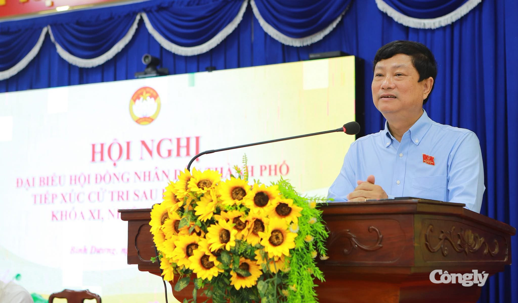 Ông Võ Văn Minh, Phó Bí thư Thành ủy, Chủ tịch HĐND TP.HCM phát biểu tại hội nghị tiếp xúc cử tri
