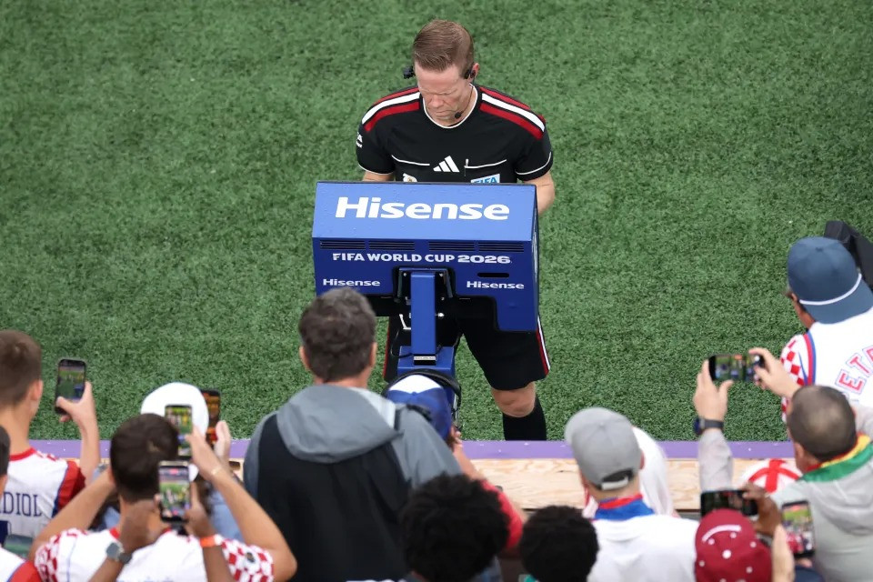 referee-drew-fischer-checks-monitor-1091555892_11zon.jpg