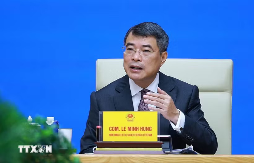 Thủ tướng Lê Minh Hưng gặp, trao đổi với các doanh nghiệp Trung Quốc đang đầu tư tại Việt Nam. (Ảnh: Dương Giang/TTXVN)