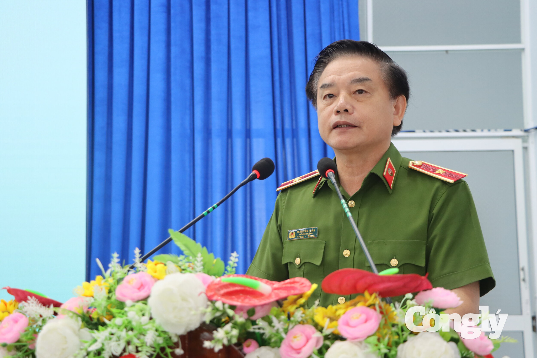 Thiếu tướng Trần Văn Toản, Phó Chánh Văn phòng Cơ quan Cảnh sát điều tra Bộ Công an phát biểu tại buổi lễ