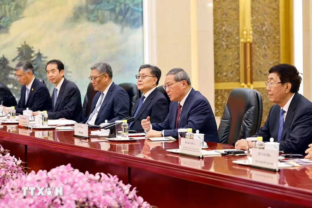ttxvn_1210-chu-tich-quoc-hoi-tiep-thu-tuong-trung-quoc-ly-cuong-4.jpg