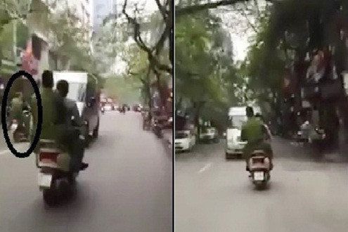 Clip ô tô cài số lùi chạy công an náo loạn đường phố Hà Nội