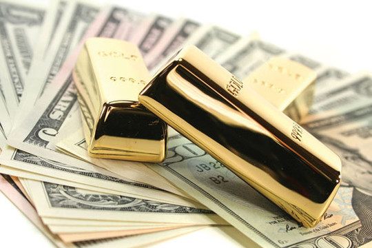 Vàng giảm giá, đồng USD hạ nhiệt ngày đầu tuần