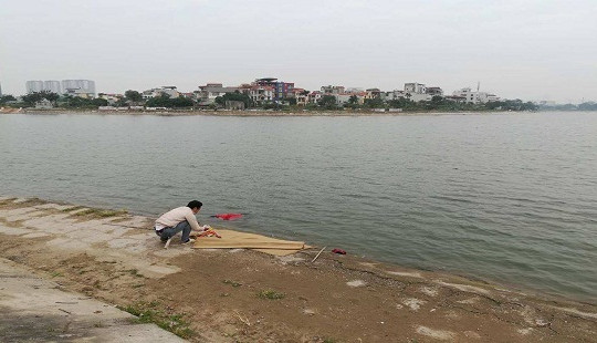 Phát hiện thi thể người đàn ông nổi ở hồ Định Công