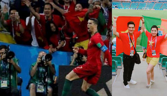 Ca sĩ Hữu Tuấn, Bùi Thuý mang quốc kỳ Việt Nam đến khán đài World Cup