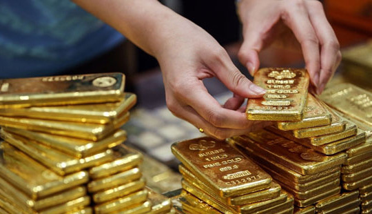 Đồng USD giảm nhẹ, giá vàng quay đầu đi lên