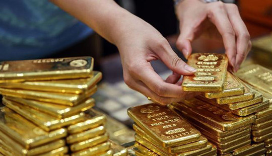 Giá vàng đi xuống dù đồng USD giảm giá