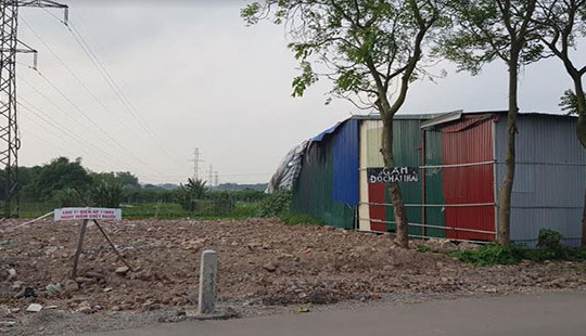 Đất đang chuyển đổi cơ cấu cây trồng bị đổ phế thải xây dựng, san lấp trái quy định