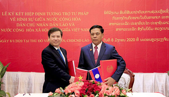 Việt Nam và Lào ký Hiệp định chuyên biệt về tương trợ tư pháp hình sự