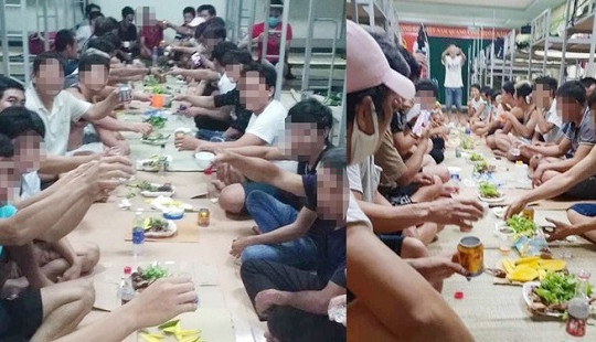 Nhóm người tổ chức ăn mừng trong khu cách ly