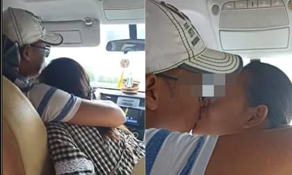 Đang lái xe, tài xế vẫn thoải mái ôm hôn bạn gái bên cạnh khiến hành khách 'nóng mắt'