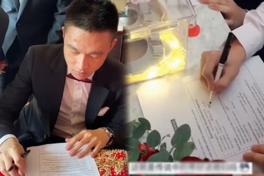 Không bắt uống rượu, nhà gái 'thách' chàng rể ngồi... làm bài IELTS lúc đón dâu
