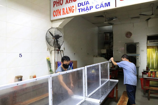 Từ 0h ngày 22/6, Hà Nội cho phép mở cửa trở lại dịch vụ ăn uống, cắt tóc gội đầu
