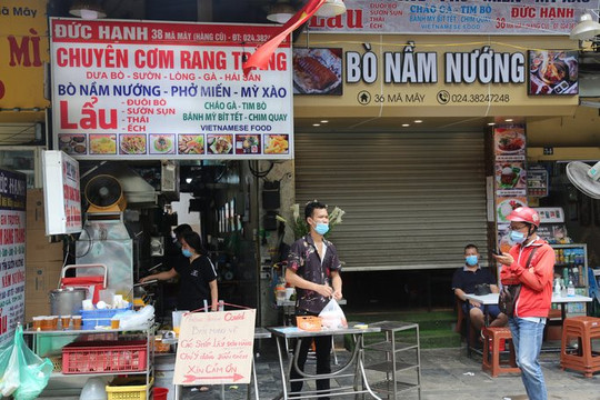 Hà Nội cho phép dịch vụ ăn, uống được bán mang về tại một số địa bàn 'vùng xanh'