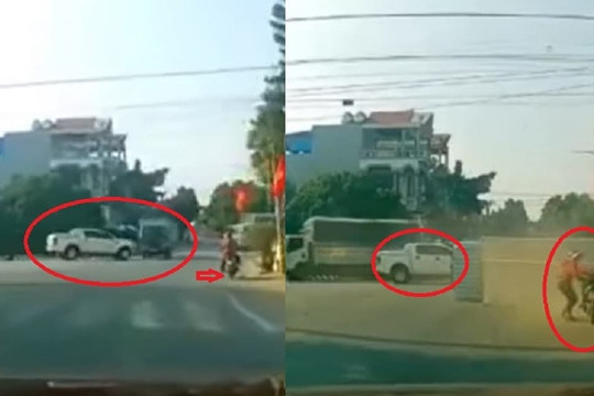 Ô tô bán tải húc xe tải lật nhào giữa ngã tư, người phụ nữ đi xe máy suýt bị vạ lây