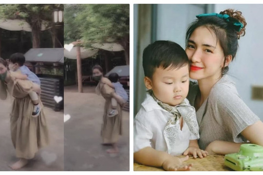 Hòa Minzy chân trần cõng con trai đi tham quan thủy cung khiến cư dân mạng xúc động