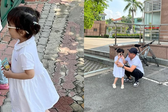 Con gái Trường Giang diện váy bồng bềnh và đeo kính râm, liên tục đùa giỡn cùng ba trong ngày bế giảng